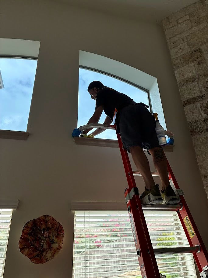 window tint installation on high up windows for glare reduction and heat control 
