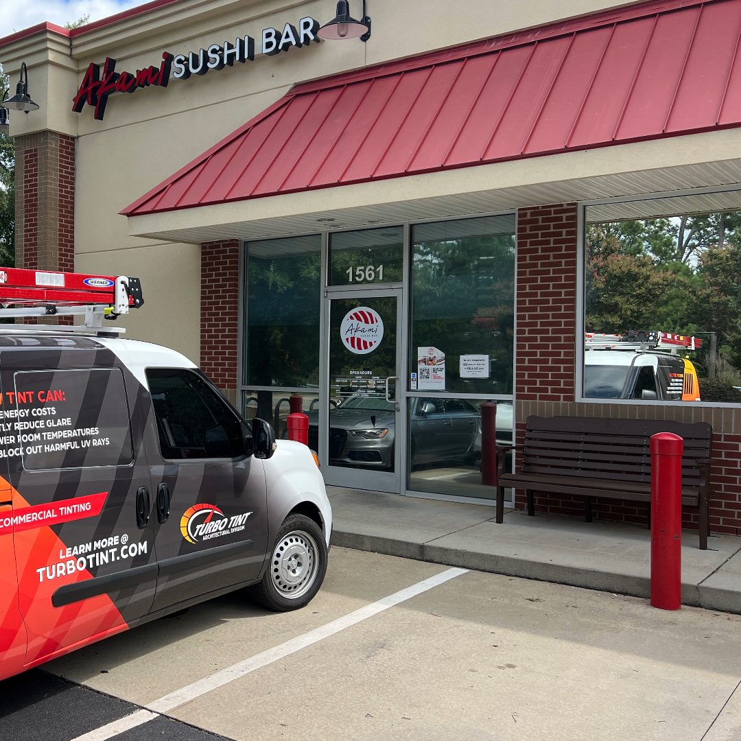 turbo tint van infront of business with reflective window tint 